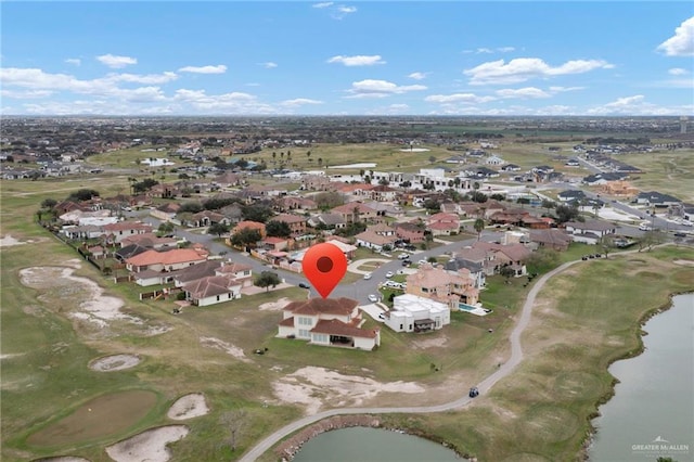 aerial view featuring a water view and a residential view