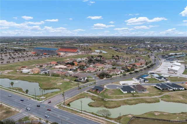 aerial view with a water view and a residential view