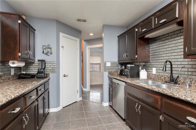 4201 N Palm Dr, Pharr, TX 78577 - kitchen featuring dishwasher, decorative backsplash, visible vents, and a sink