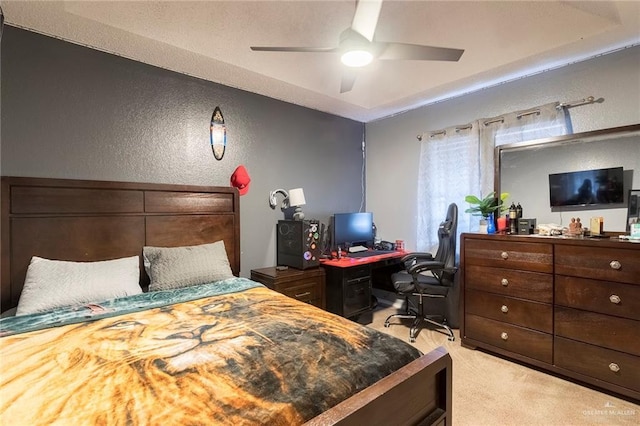 4201 N Palm Dr, Pharr, TX 78577 - bedroom featuring light carpet, a ceiling fan, and a textured wall