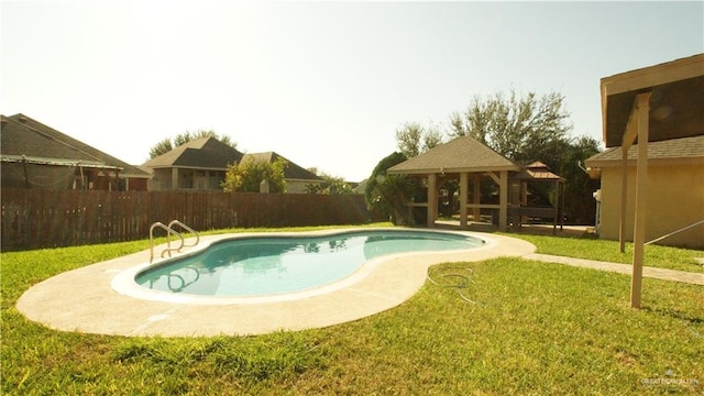 view of pool featuring a gazebo and a yard