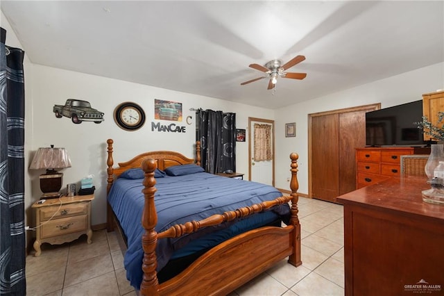 bedroom featuring ceiling fan and light tile patterned floors