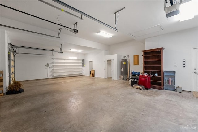 garage with a garage door opener and water heater