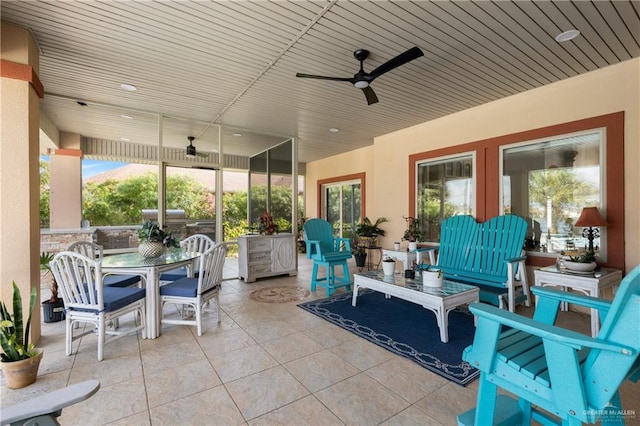 view of patio featuring ceiling fan