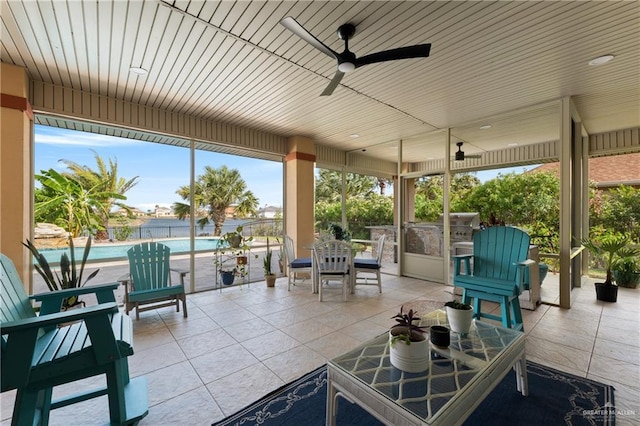 view of patio / terrace with area for grilling and ceiling fan