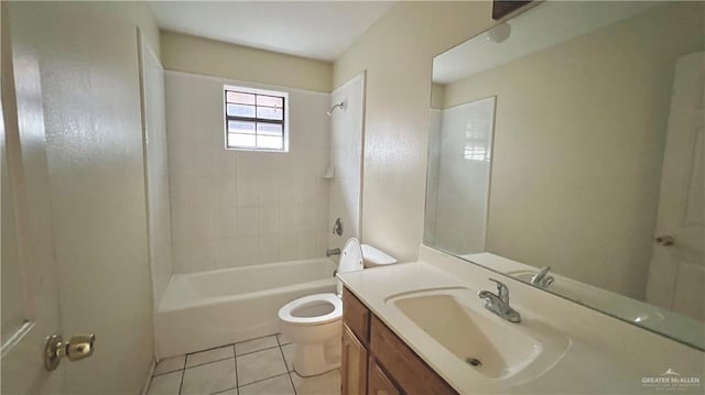 full bathroom featuring tile patterned flooring, tiled shower / bath combo, toilet, and vanity