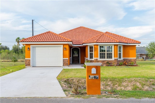 view of front of house with a garage, driveway, a tile roof, a front lawn, and stucco siding