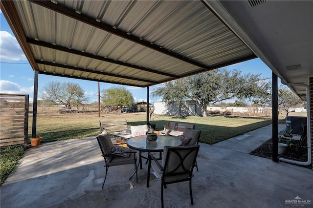 view of patio / terrace with outdoor dining area and a fenced backyard