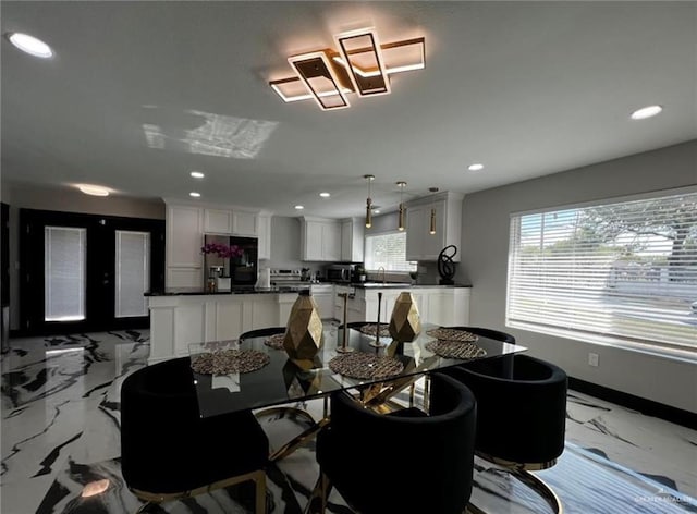 dining space with recessed lighting, marble finish floor, french doors, and baseboards