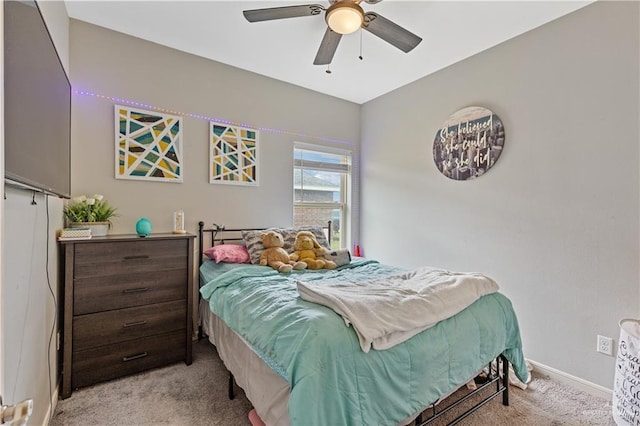 bedroom featuring ceiling fan and light colored carpet