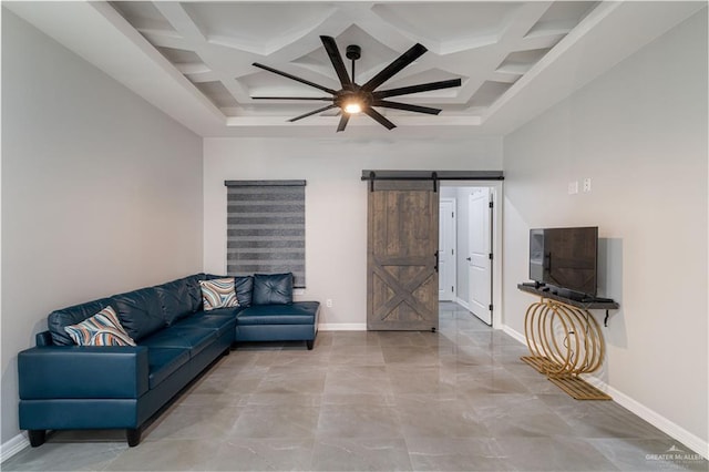 living room featuring coffered ceiling, a barn door, and beamed ceiling