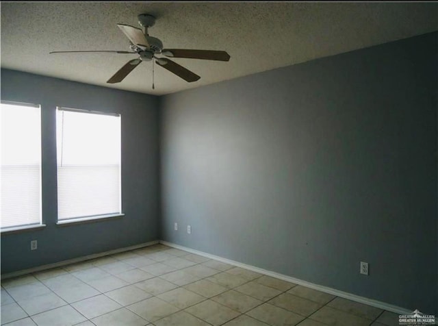 2246 Llano Grande Ln, Edinburg, TX 78542 - unfurnished room featuring a textured ceiling, a wealth of natural light, ceiling fan, and light tile patterned floors