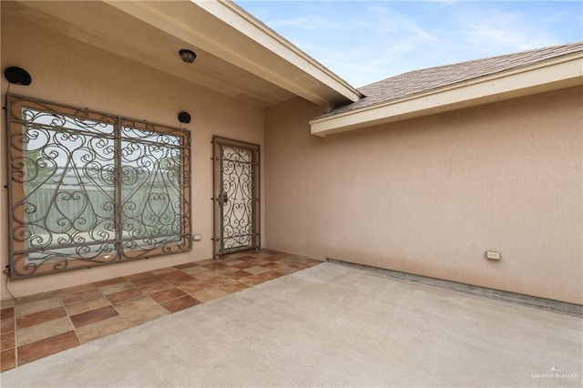 property entrance with a patio area