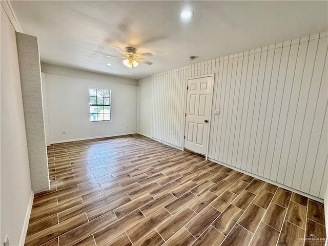 1313 Royal Palm St, Alamo, TX 78516 - spare room featuring dark wood-style flooring, ceiling fan, baseboards, and recessed lighting