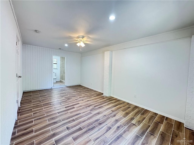 1313 Royal Palm St, Alamo, TX 78516 - unfurnished room with wood finished floors, ceiling fan, a smoke detector, baseboards, and recessed lighting