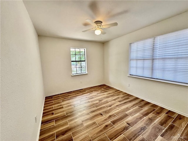 1313 Royal Palm St, Alamo, TX 78516 - unfurnished room featuring wood finished floors, ceiling fan, and baseboards