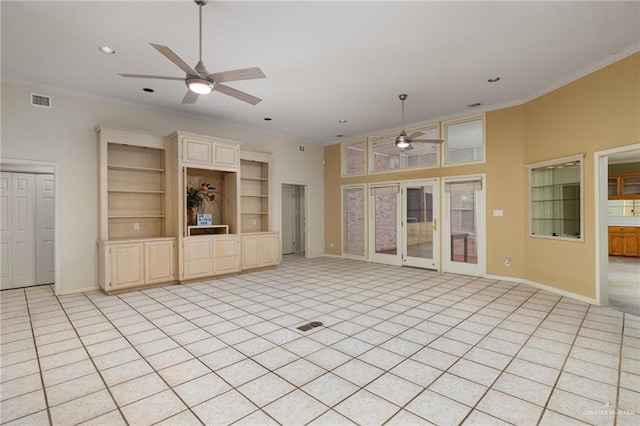 unfurnished living room with ceiling fan, ornamental molding, visible vents, and baseboards