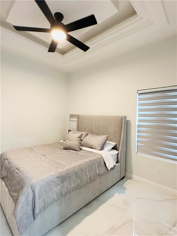 1509 Giselle St, Mission, TX 78574 - bedroom with a raised ceiling, ceiling fan, and crown molding