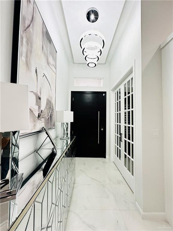 1509 Giselle St, Mission, TX 78574 - foyer featuring light marble finish floors