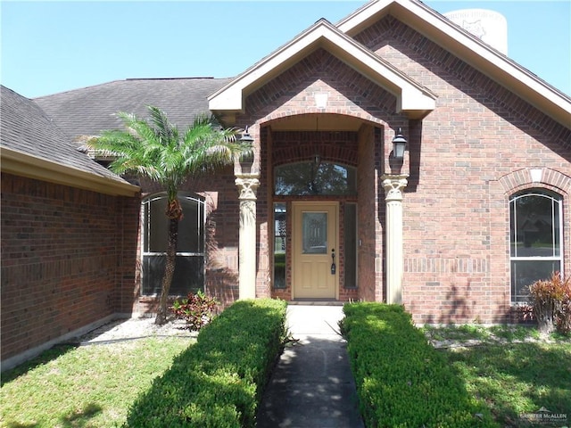 3519 Aspen Dr, Edinburg, TX 78542 - property entrance with brick siding