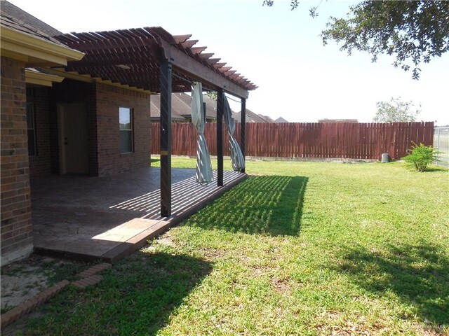 3519 Aspen Dr, Edinburg, TX 78542 - fenced backyard featuring a pergola and a patio