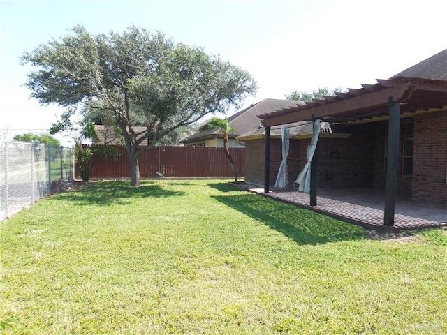 3519 Aspen Dr, Edinburg, TX 78542 - fenced backyard with a pergola and a patio area