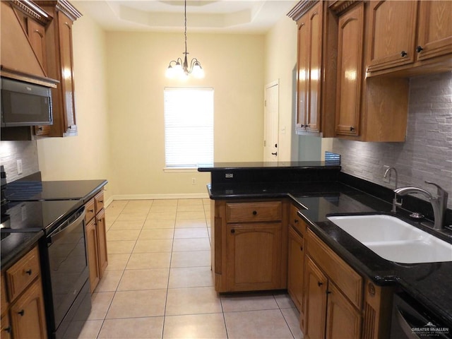 kitchen featuring sink, decorative light fixtures, light tile patterned floors, appliances with stainless steel finishes, and a notable chandelier