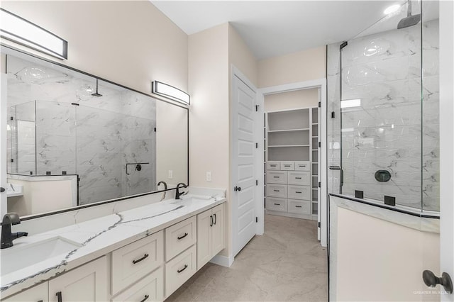 5308 N 42nd St, Mcallen, TX 78504 - bathroom with double vanity, marble finish floor, a sink, and a stall shower