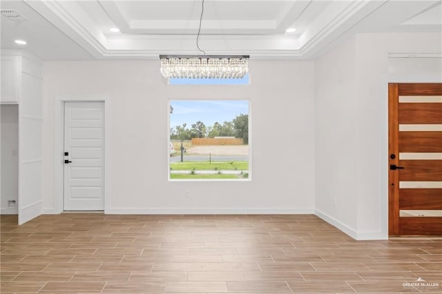 interior space with a tray ceiling