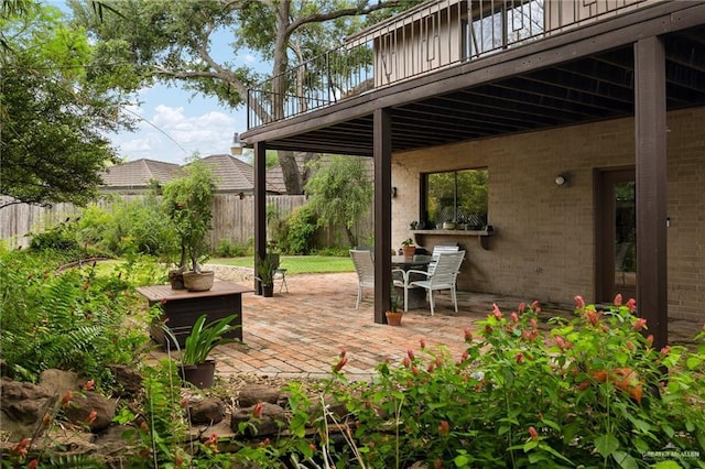 1113 Xanthisma Ave, Mcallen, TX 78504 - view of patio / terrace featuring fence and outdoor dining area