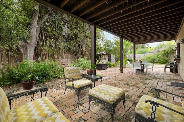 1113 Xanthisma Ave, Mcallen, TX 78504 - view of patio / terrace with outdoor dining space and a fenced backyard
