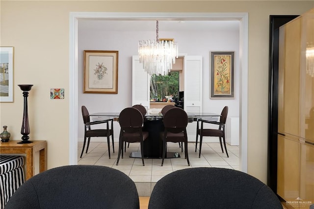 1113 Xanthisma Ave, Mcallen, TX 78504 - dining space with light tile patterned flooring, a chandelier, baseboards, and radiator