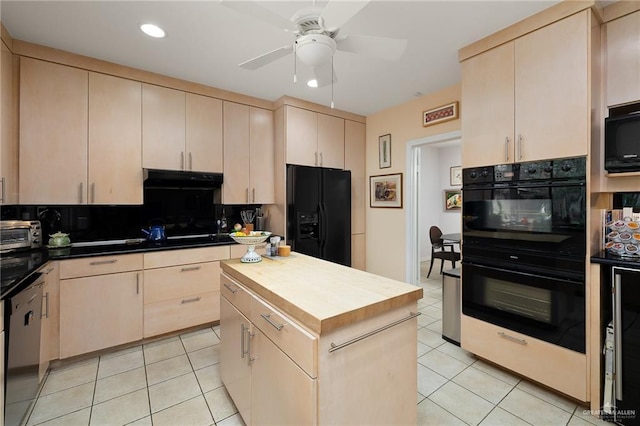 1113 Xanthisma Ave, Mcallen, TX 78504 - kitchen with black appliances, light tile patterned flooring, butcher block countertops, and light brown cabinetry