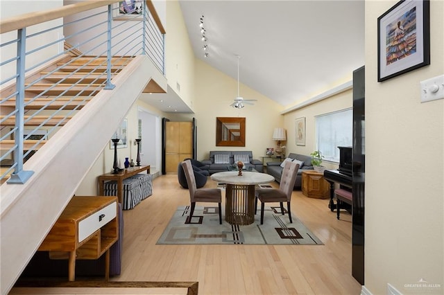1113 Xanthisma Ave, Mcallen, TX 78504 - dining space with ceiling fan, high vaulted ceiling, and wood finished floors