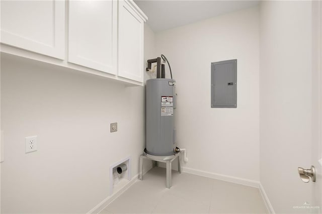 laundry room with cabinets, electric dryer hookup, water heater, light tile patterned floors, and electric panel