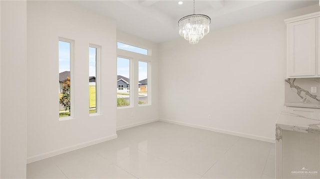 unfurnished dining area with light tile patterned floors and a notable chandelier