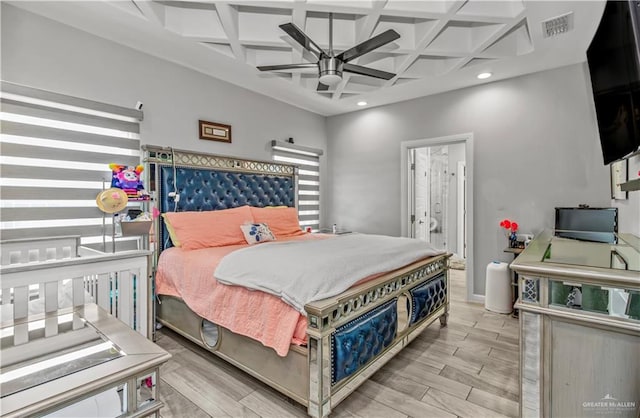 bedroom featuring beamed ceiling, ceiling fan, and coffered ceiling