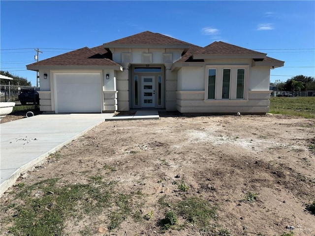 view of front of property featuring a garage