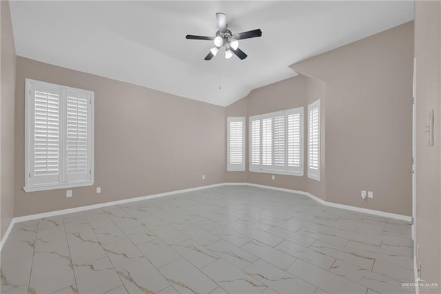 3902 Green Jay Dr, Mission, TX 78572 - empty room with marble finish floors, ceiling fan, baseboards, and vaulted ceiling