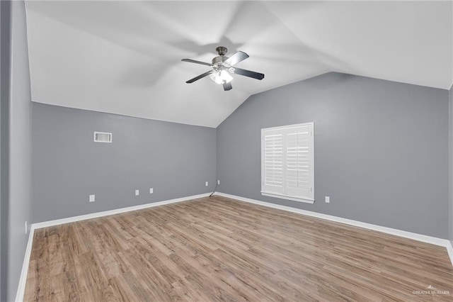 3902 Green Jay Dr, Mission, TX 78572 - additional living space featuring a ceiling fan, vaulted ceiling, wood finished floors, and baseboards