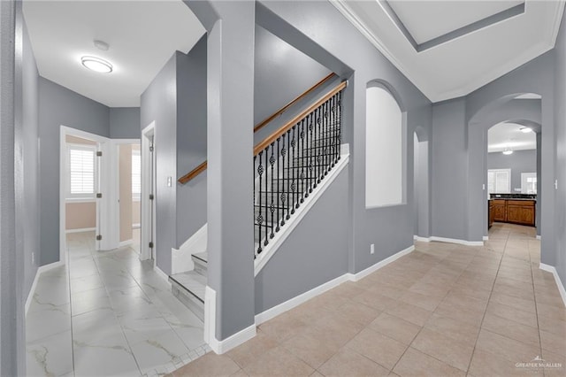 3902 Green Jay Dr, Mission, TX 78572 - hallway featuring arched walkways, baseboards, and stairs