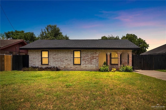 403 N 1st St, Donna, TX 78537 - view of front of house with brick siding and roof with shingles
