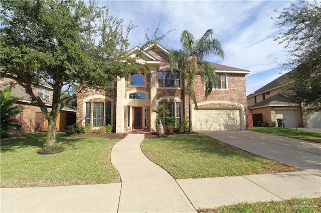 view of front of home with a garage and a front lawn