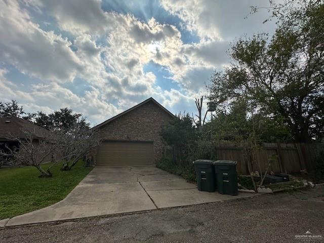 view of home's exterior with a yard