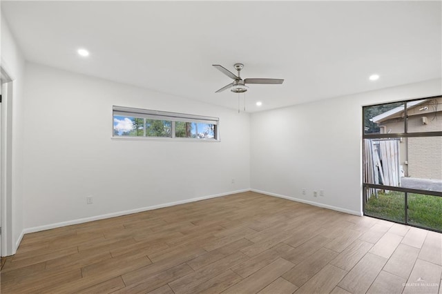 spare room featuring ceiling fan and wood-type flooring