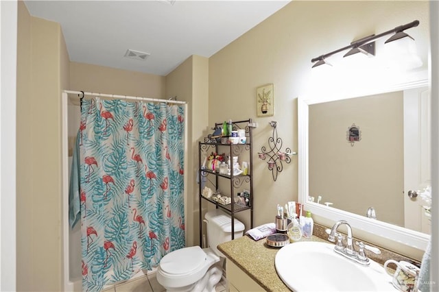 bathroom with tile patterned flooring, vanity, toilet, and a shower with shower curtain