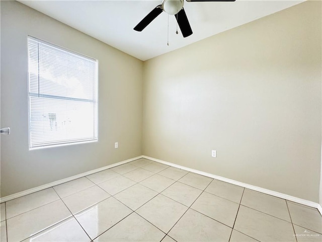 1411 Oak St, Weslaco, TX 78596 - spare room with baseboards, ceiling fan, and light tile patterned floors