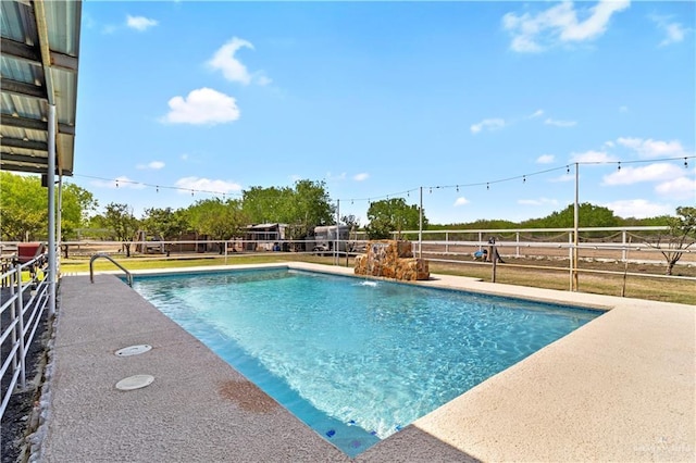 view of pool featuring a fenced in pool