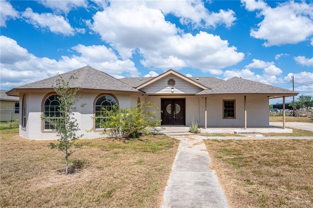 single story home with a front yard