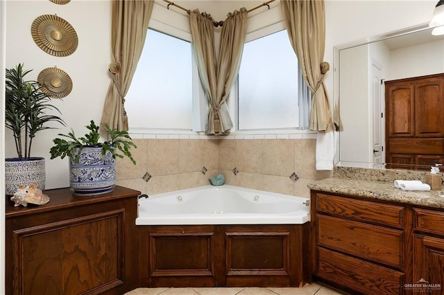 806 Beryl Cir, Weslaco, TX 78596 - bathroom with plenty of natural light, a garden tub, and vanity